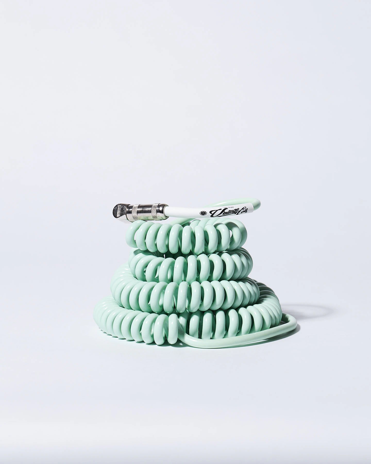Surf Green coiled guitar cable product photo Voltage Vintage Coil®