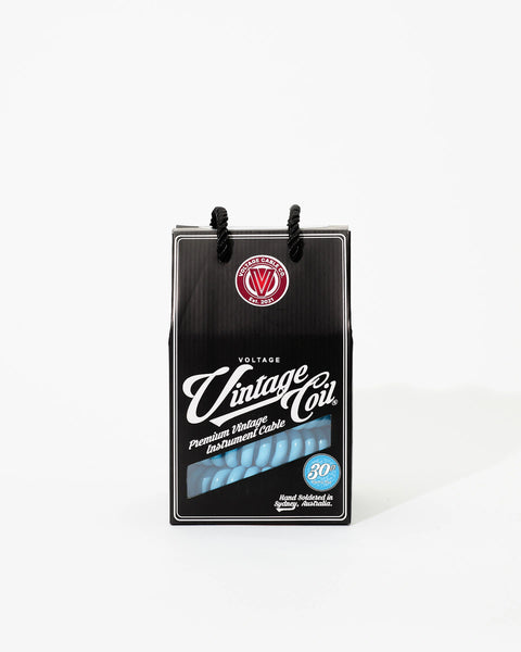 30 ft Electric-Blue coiled guitar cable in retail box

