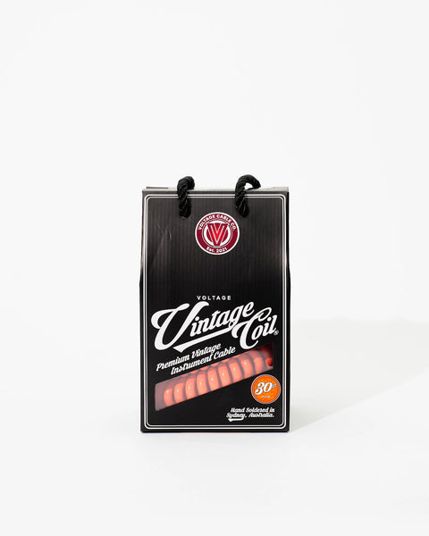 30 ft Orange coiled guitar cable in retail box
