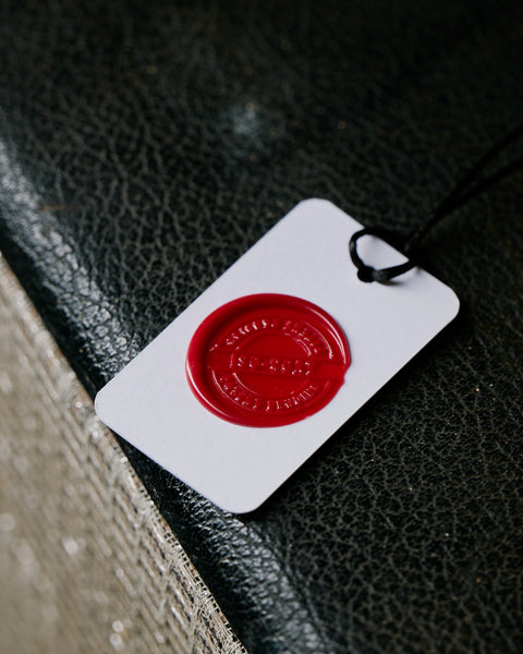 ISO-COAT® wax seal quality card for coiled guitar cables 
